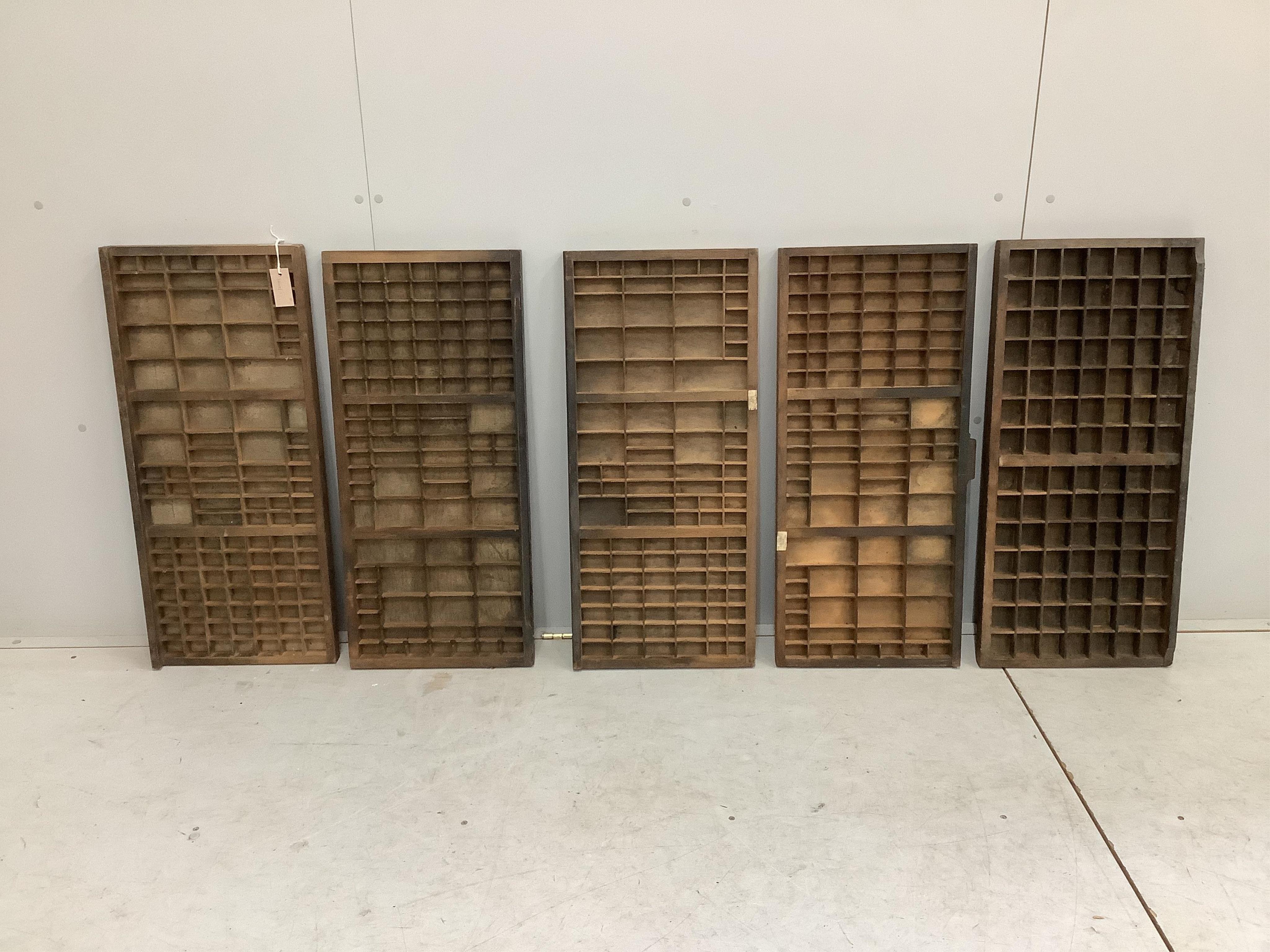 Ten printer's typeface trays, width 36cm, height 80cm together with a small pine pigeon hole unit. Condition - fair